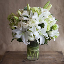 Load image into Gallery viewer, sympathy floral arrangement white ranunculus lilies green hydrangeas
