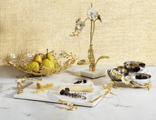 Load image into Gallery viewer, Michael Aram Orchid items charcuterie spread white marble, gold and white handles
