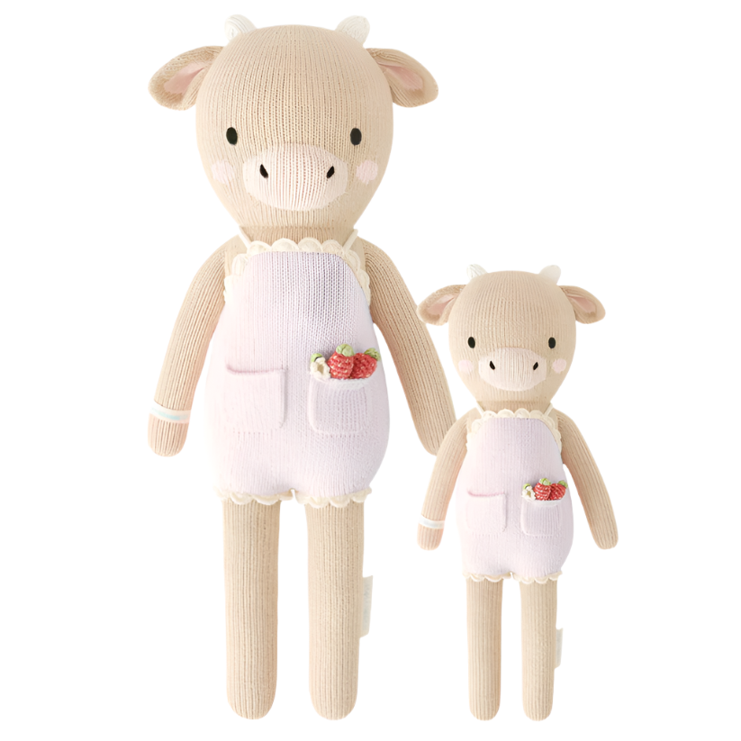 Cuddle and Kind ava the cow knitted doll in powder pink overalls