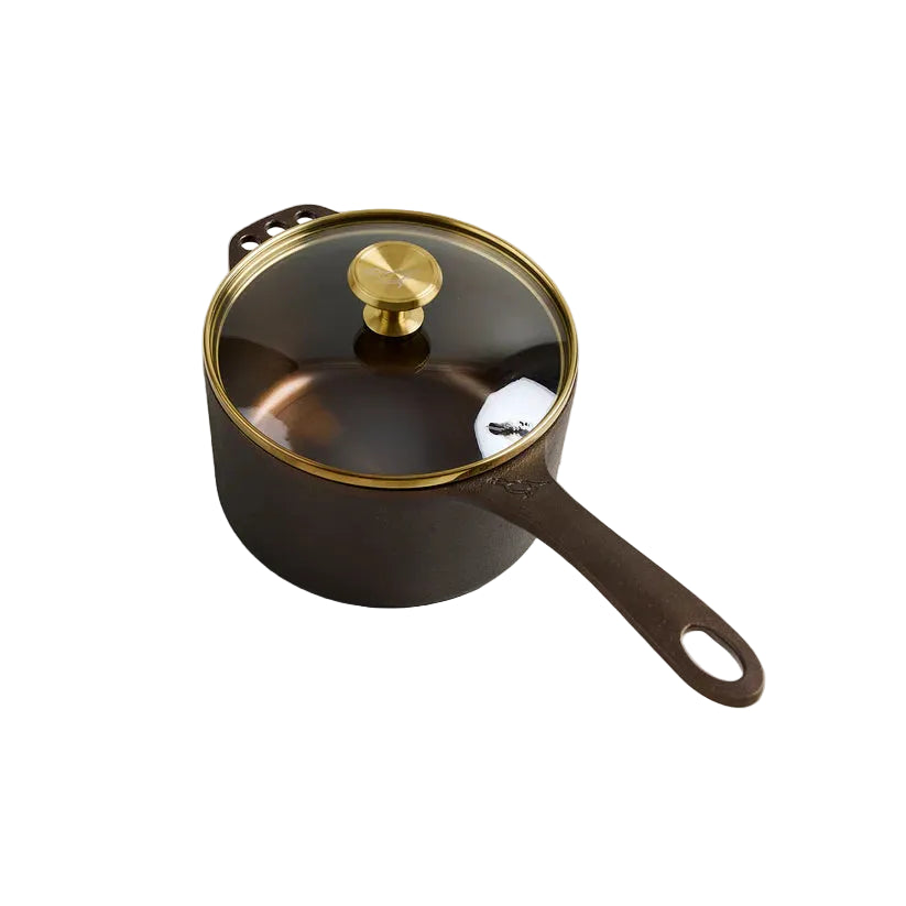 Black saucepan with a gold rimmed glass lid 