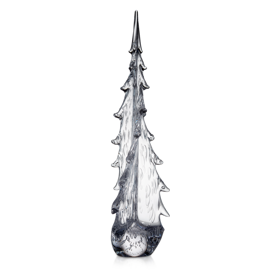 Decorative glass Christmas tree sculpture on a white background