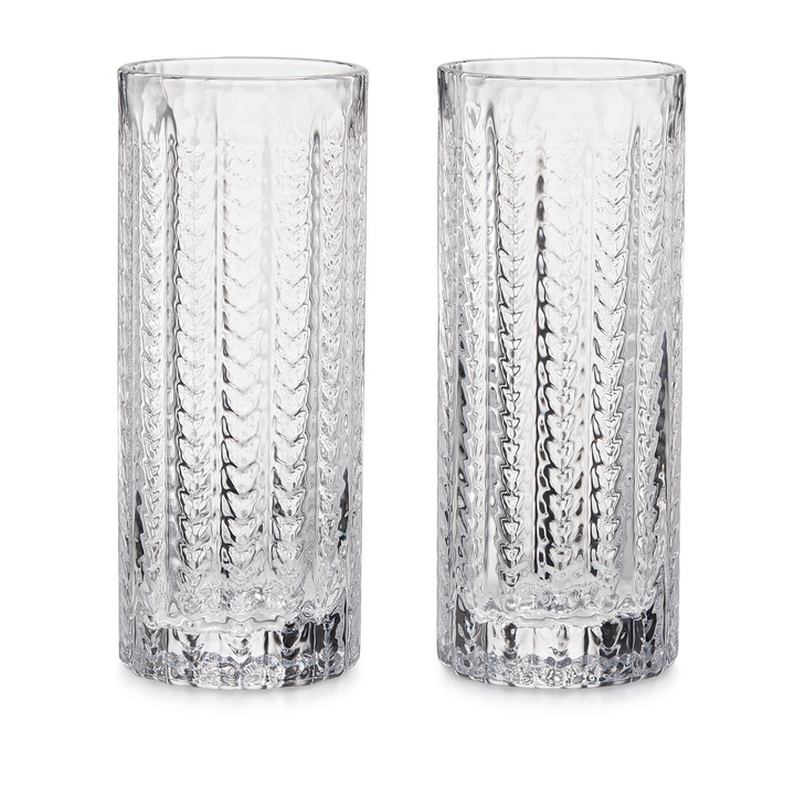 Two clear textured drinking glasses with vertical diamond-cut patterns, shown side by side on a white background.