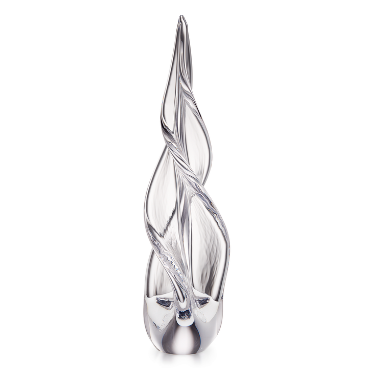 A modern christmas tree glass sculpture with a twisted, flame-like form, made of transparent clear glass