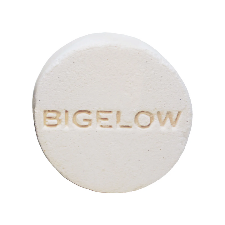 A round shower steam tablet