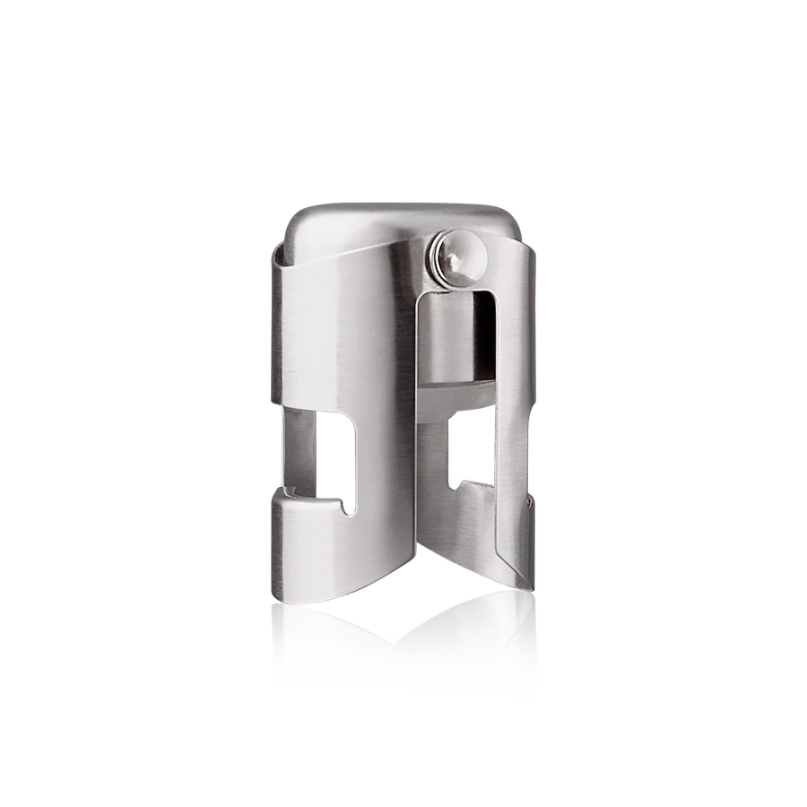 Metallic champagne stopper on a white background