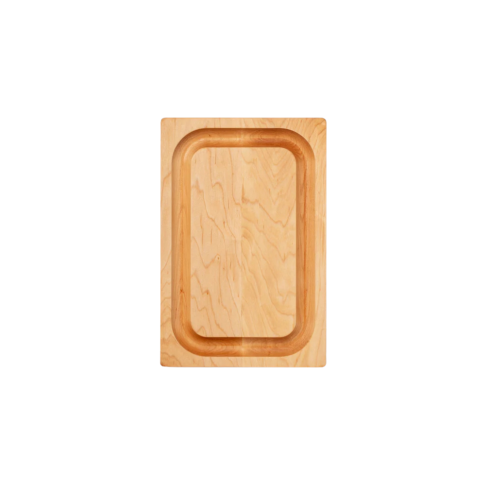 Wooden cutting board with grooves on a white background