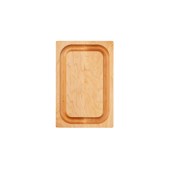 Wooden cutting board with grooves on a white background