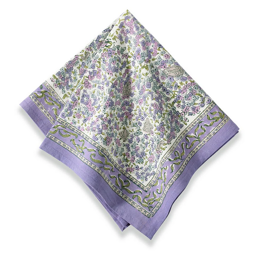 a lavender floral patterned linen with a purple border