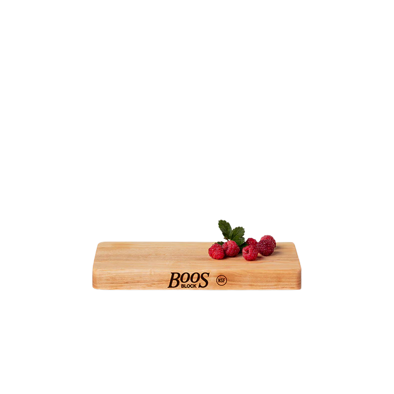 Bamboo block with raspberries and mint leaves, featuring the brand 'BOOS Block'.