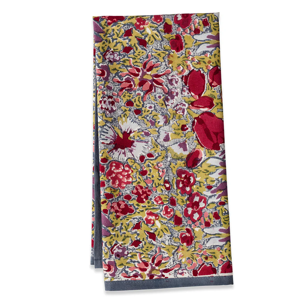Floral patterned tea towel with red, yellow, and pink colors on a white background