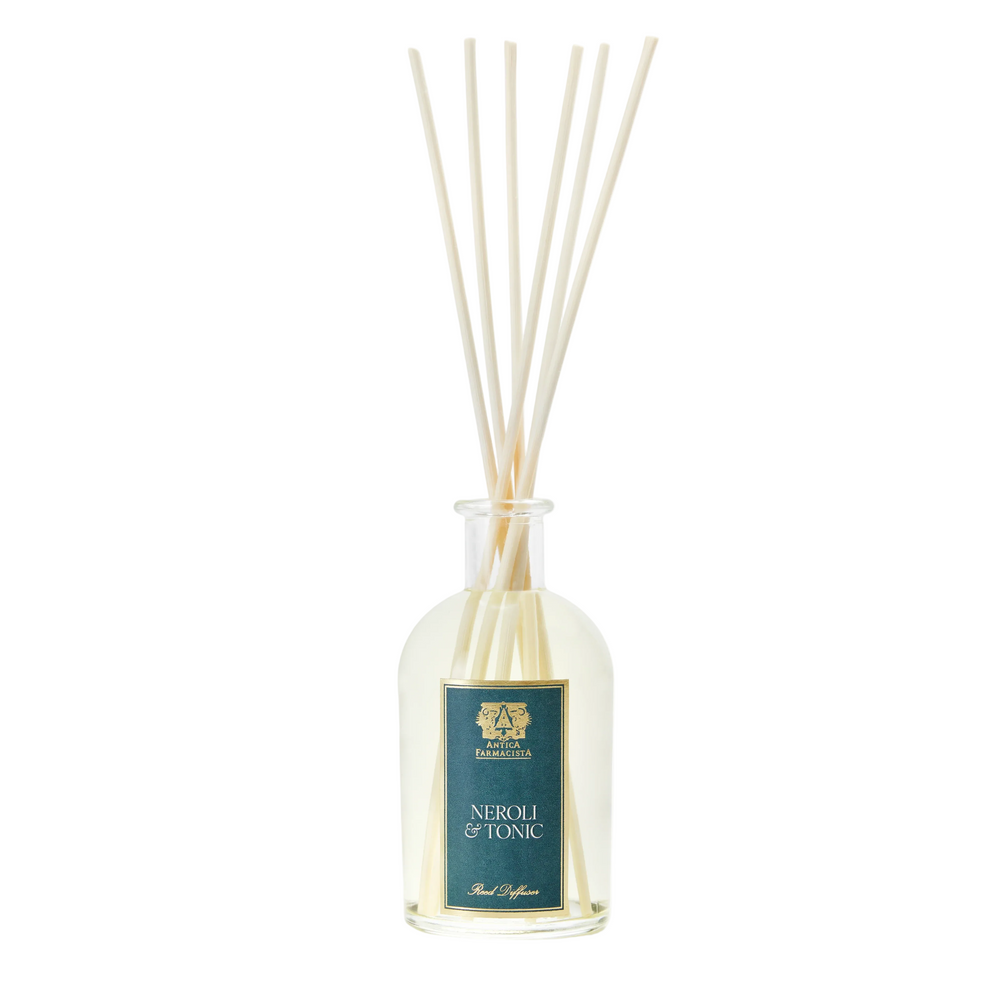 antica farmacista neroli and tonic reed diffuser with wooden sticks in a clear bottle