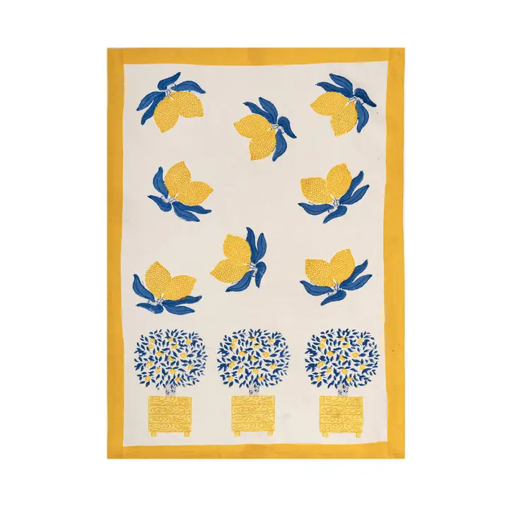 Decorative yellow and blue tea towel with lemon and tree pattern 