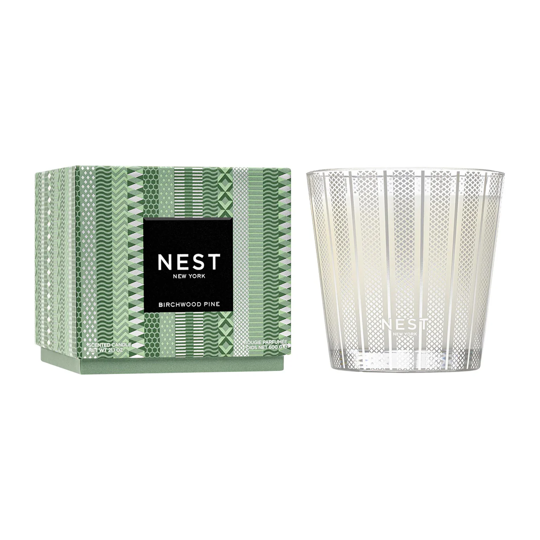 Nest New York birchwood pine candle and packaging on a white background