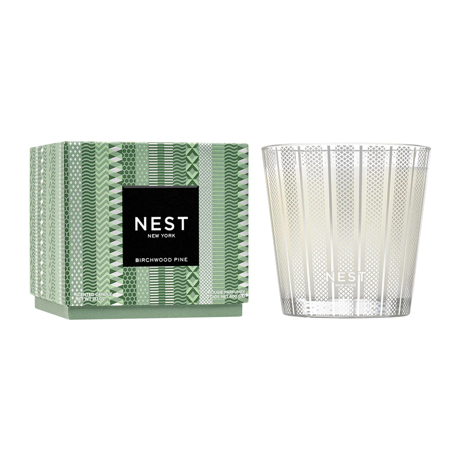 Nest New York birchwood pine candle and packaging on a white background