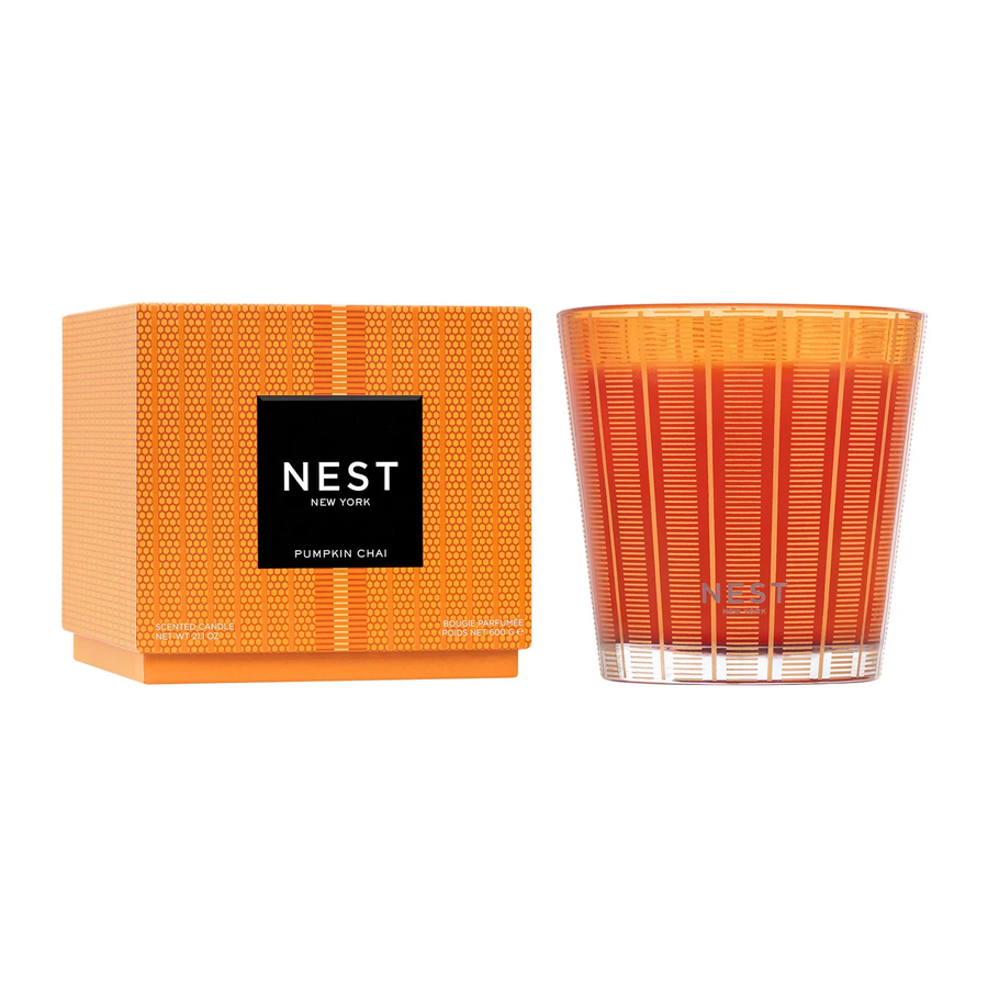  NEST New York Pumpkin Chai candle next to its packaging