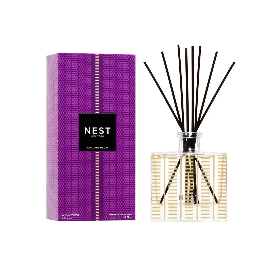 Nest autumn plum diffuser with purple packaging on a white background