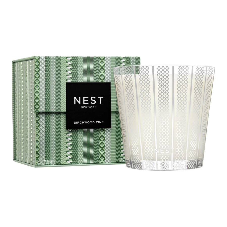 NEST New York Birchwood Pine candle with decorative box on a white background
