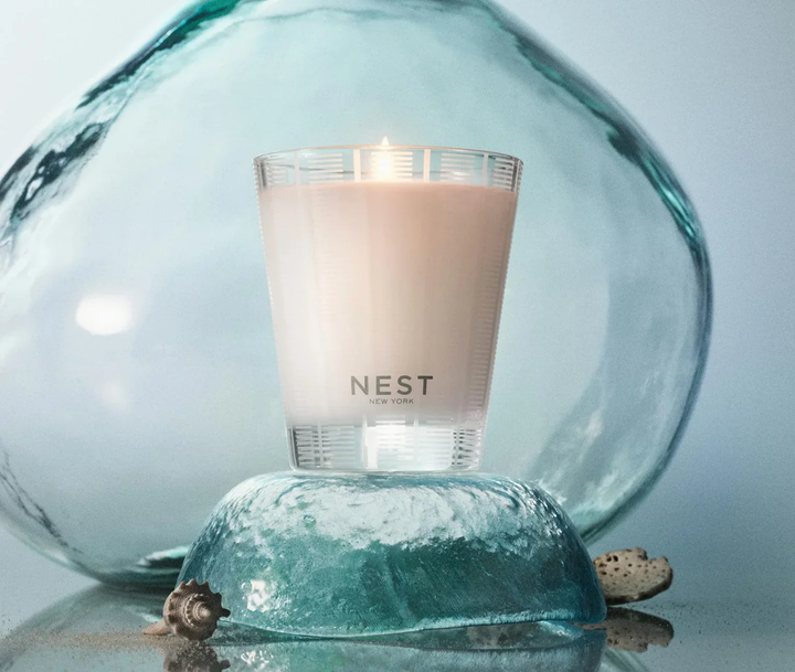 NEST Ocean Mist and Sea Salt on a blue glass holder 