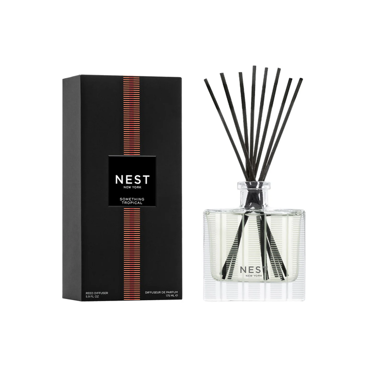 Nest Something Tropical reed diffuser with its packaging