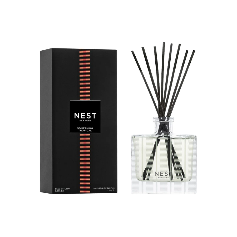 Nest Something Tropical reed diffuser with its packaging