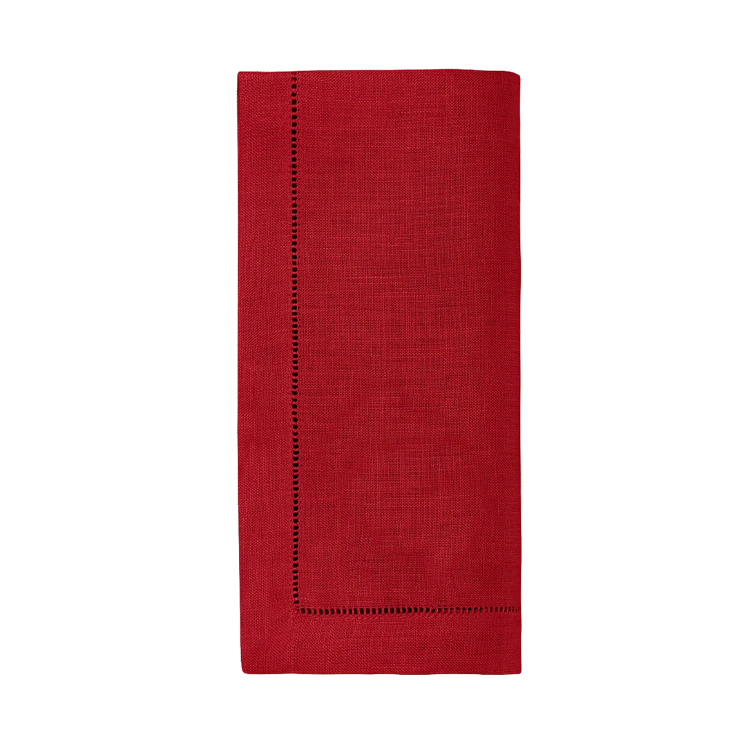 Red napkin with stitched hem on a white background