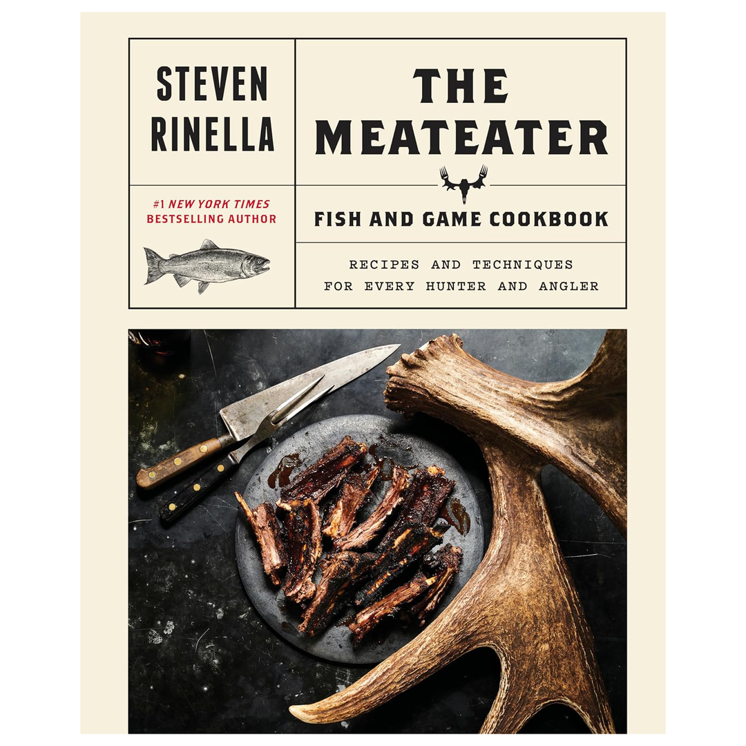 Book cover of 'The Meateater Fish and Game Cookbook' by Steven Rinella with a plate of smoked meat, knife, and deer antler.