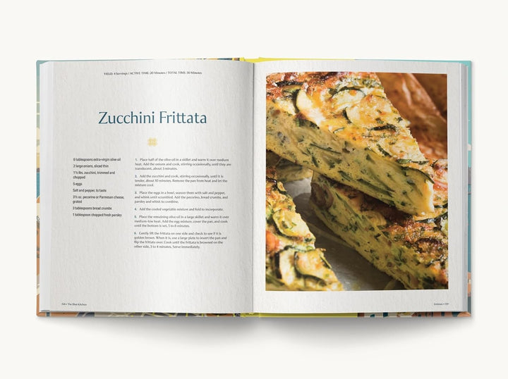 A recipe book open to a recipe for Zuccini Frittata