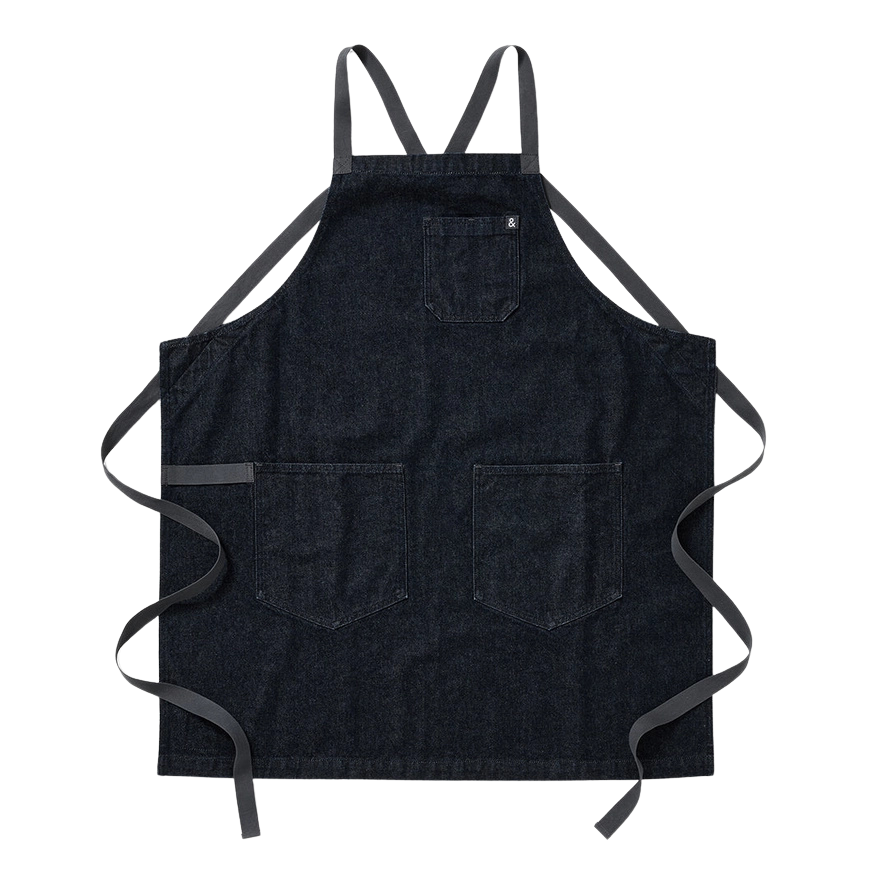 Blue denim apron with straps on a white background