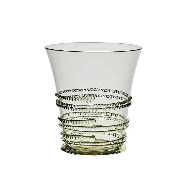 Clear glass tumbler with spiral design on a white background