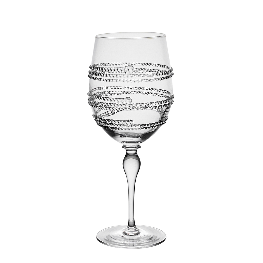 Clear glass wine glass with spiral design on a white background