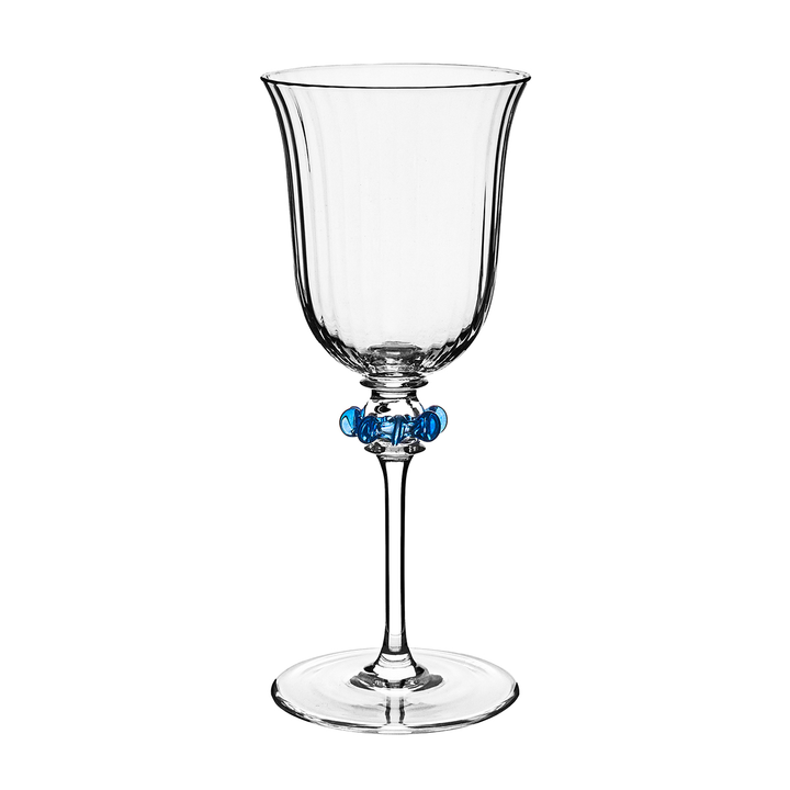 Clear glass wine glass with blue decorative element on a white background