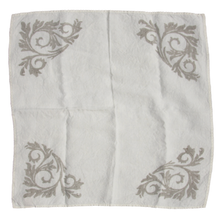 Load image into Gallery viewer, white linen napkin with slate grey designs on corners
