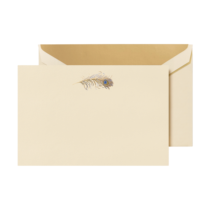 Ecru card with peacock feather design on a white background