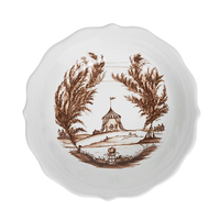 Decorative plate with brown tree and tent design on a white background