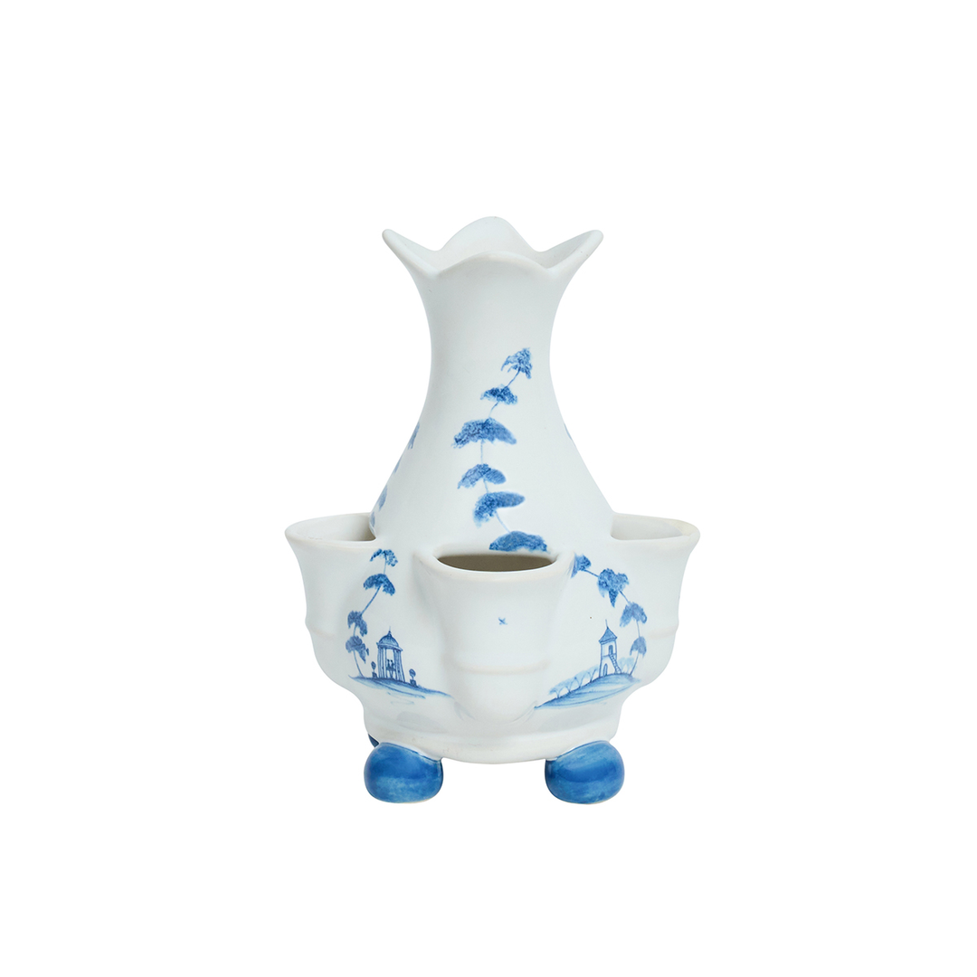 White ceramic vase with blue floral patterns