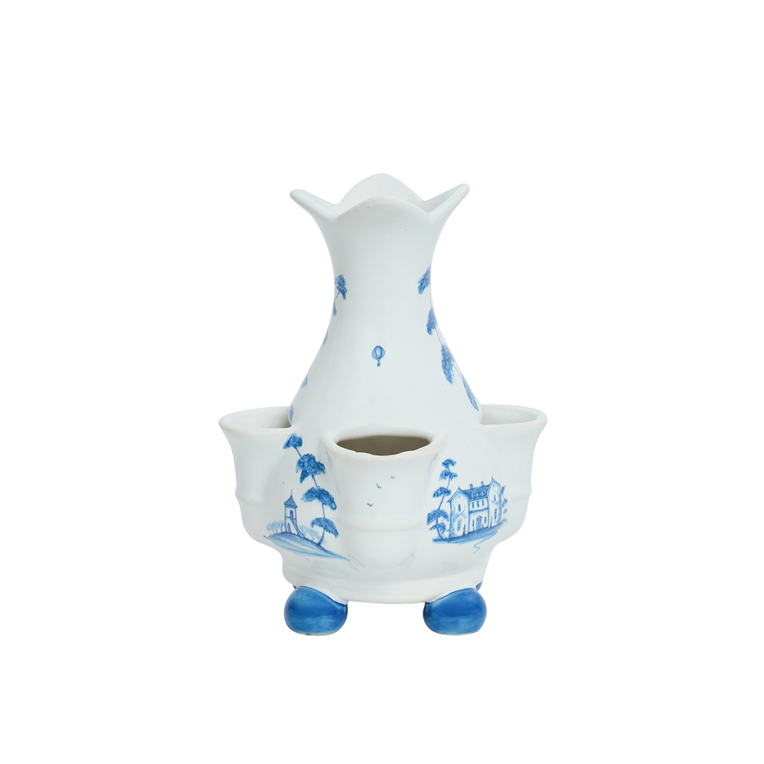 White ceramic vase with blue floral patterns
