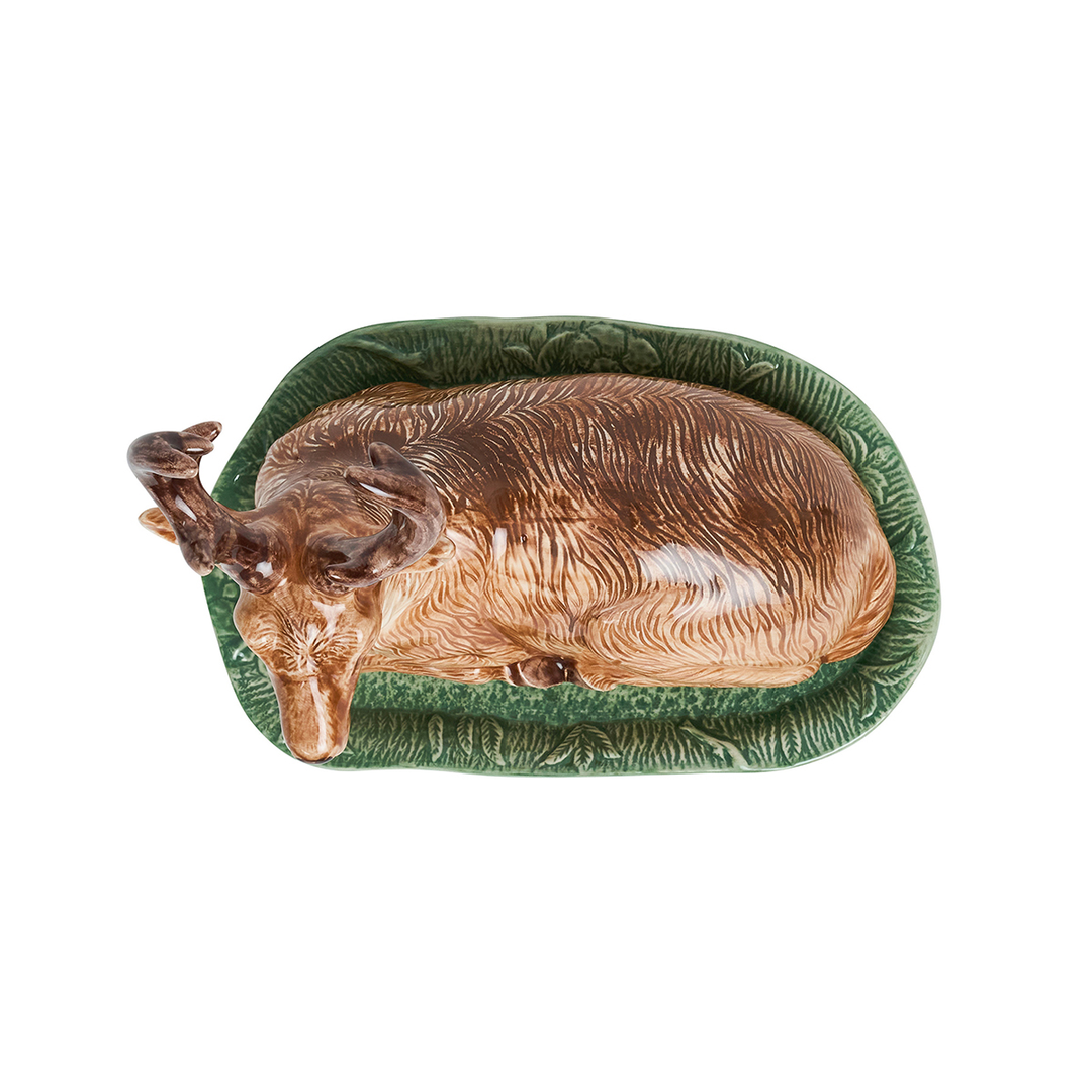 top view of a butter dish with a decorative deer lid