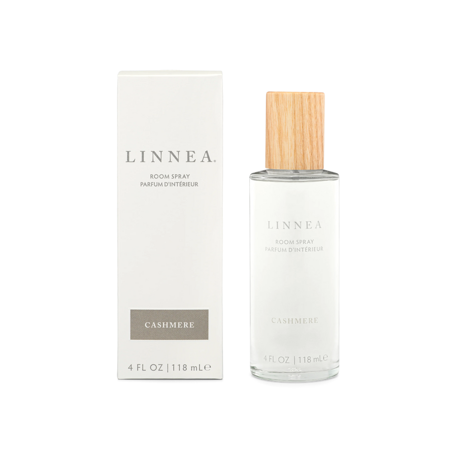 Linnea cashmere room spray bottle next to its packaging