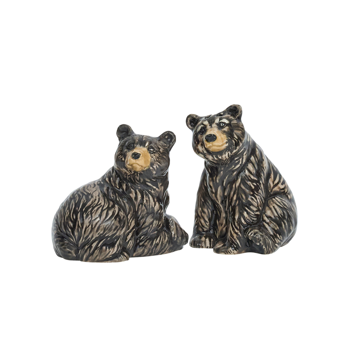 Two bear figurines on a white background