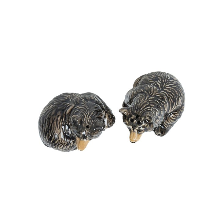 Two bear figurines on a white background