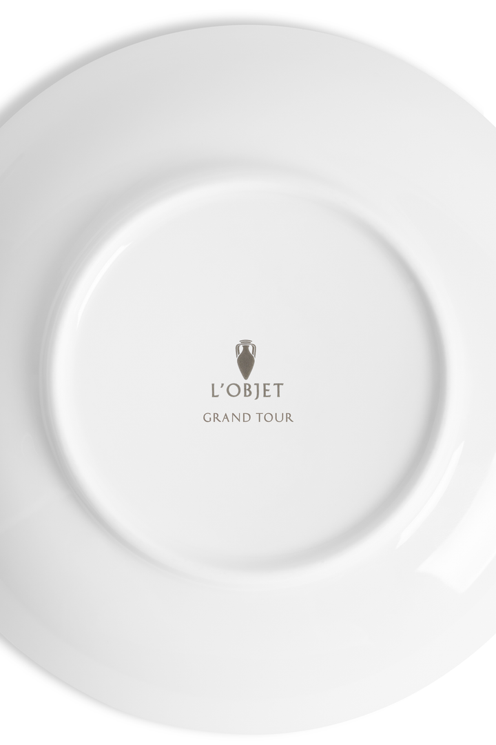 Underside of a white plate with 'L'Objet Grand Tour' branding 