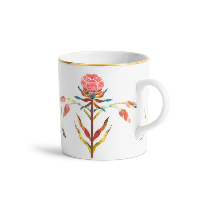 A white porcelain coffee cup with painted floral designs and a gold rim