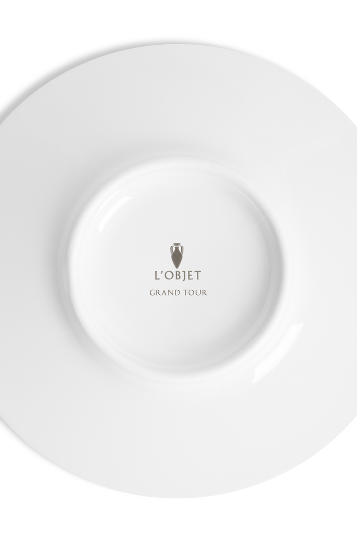 White plate with 'L'Objet Grand Tour' logo 