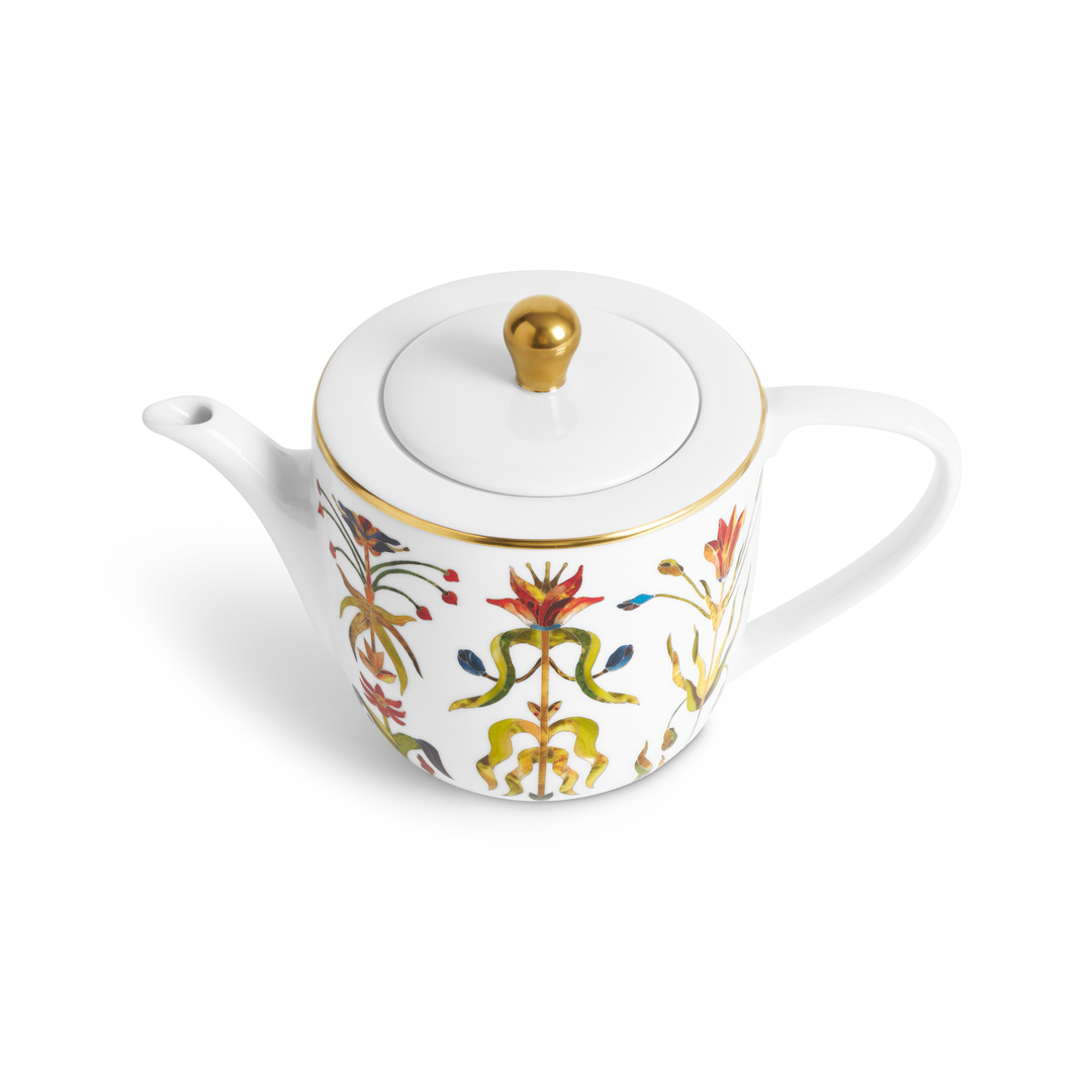 A white porcelain teapot with painted floral motifs, a gold rim, and a gold knob on the lid