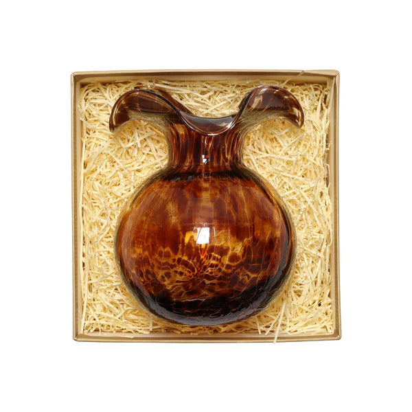Brown glass vase in a decorative box with straw padding