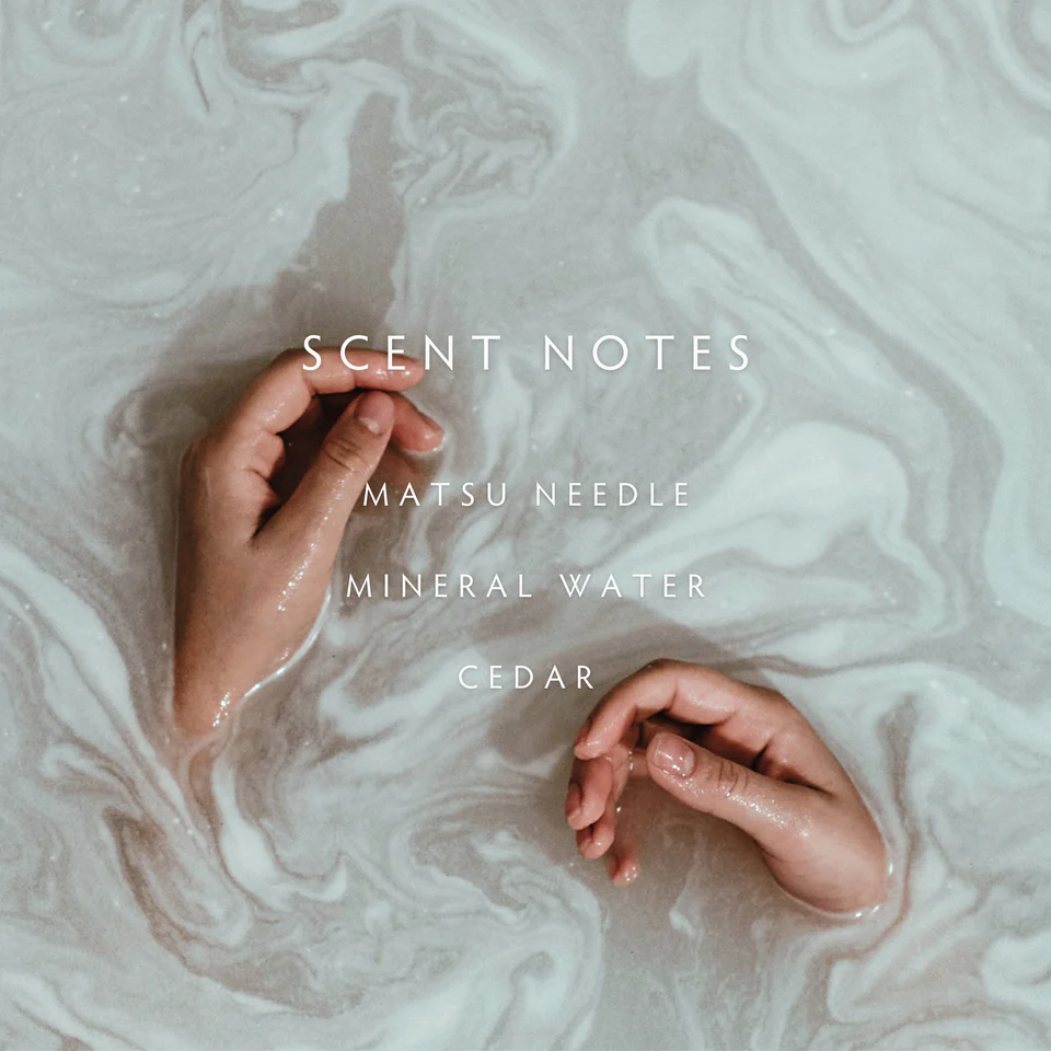 Hands in water with 'Scent Notes' text overlay
