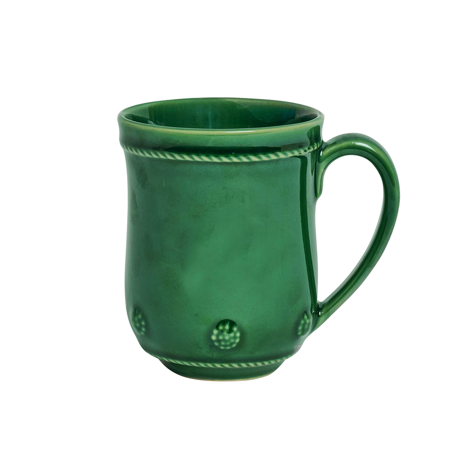 Green ceramic mug with decorative patterns 