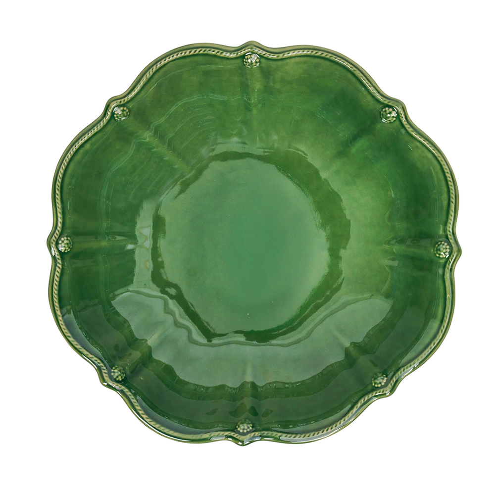 Green ceramic plate with decorative edge