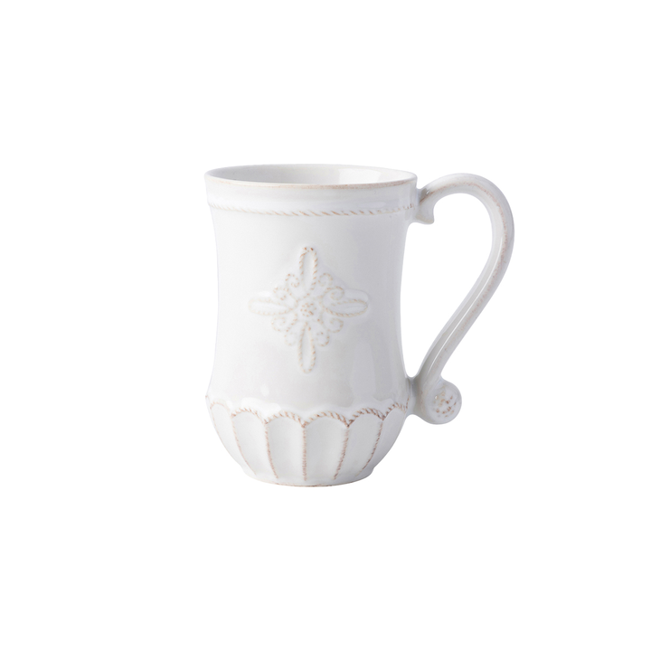 A white mug with an ornate threaded design and a curved decorative handle