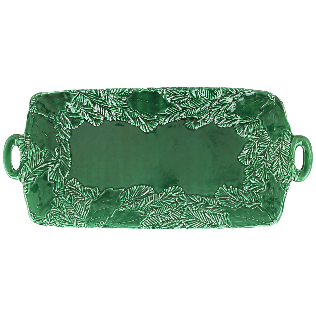 Green ceramic tray with holly pattern on a white background